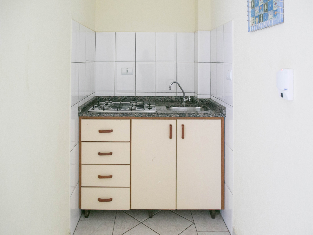 Foto da cozinha do apartamento família no Bombinhas Praia Apart Hotel II